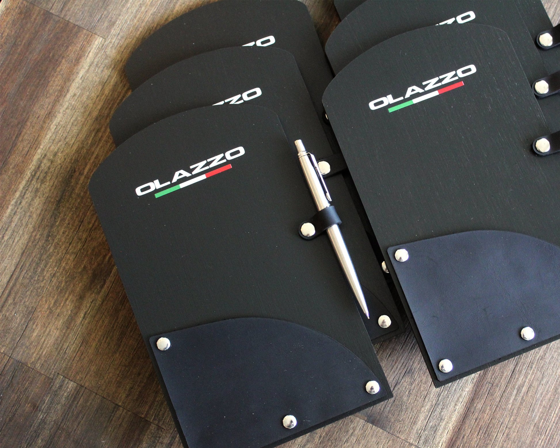 Custom printed check holder with nickel rivets and pen loop