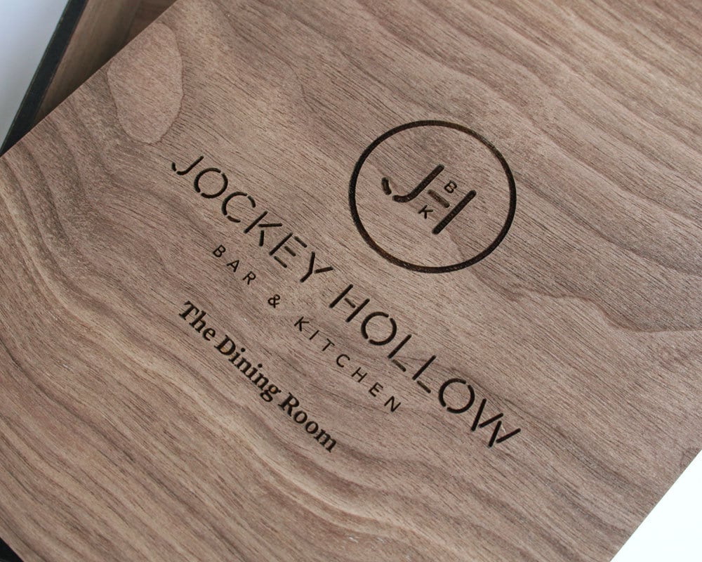 Close-up of engraving detail on solid wanut