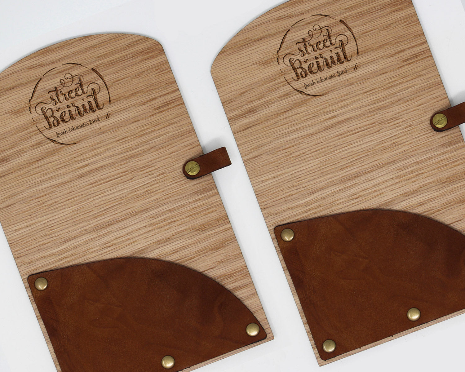 Restaurant check holder made of oak veneer and full-grain leather