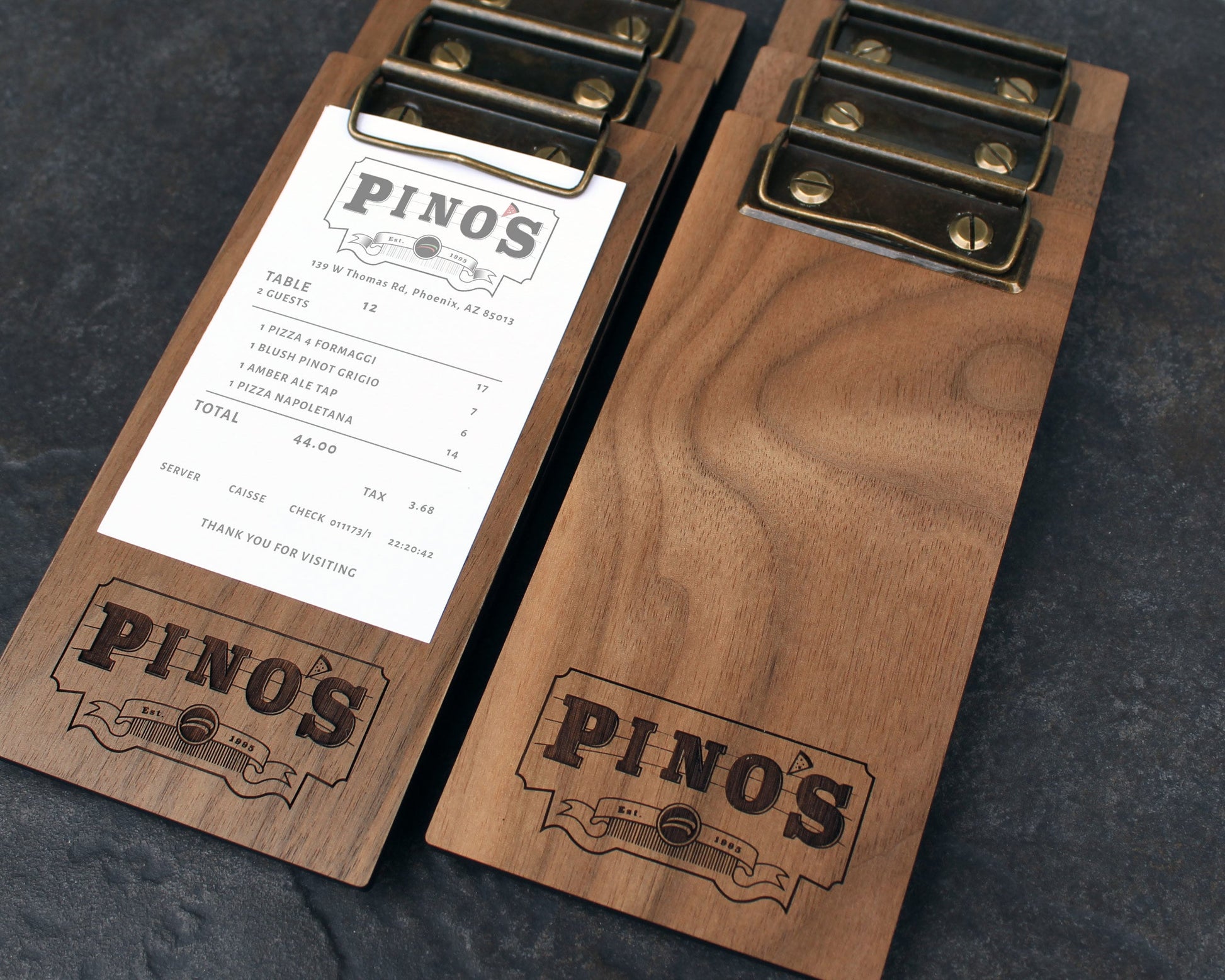 Custom engraved restaurant bill holder in solid walnut