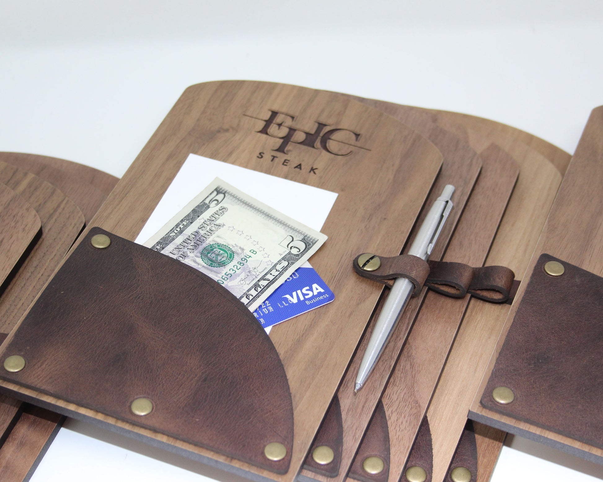 Custom walnut check presenter with logo and pen holder