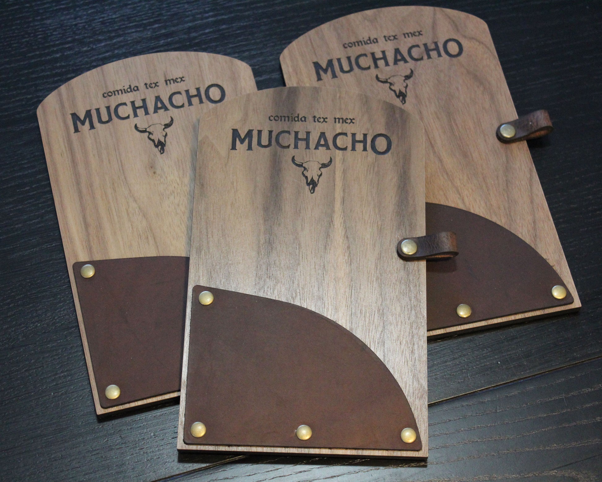 Engraved walnut and leather check presenter with brass rivets