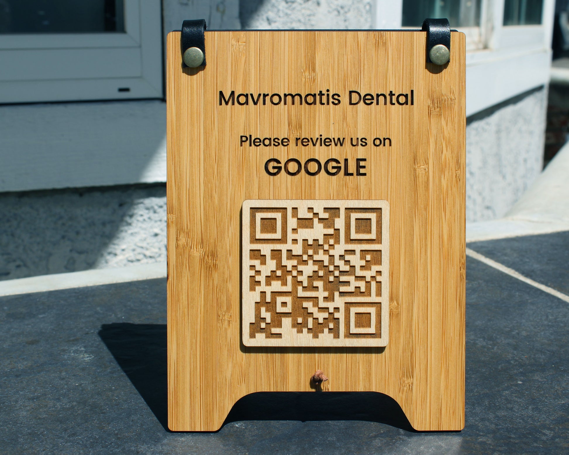 Wooden sign with QR code and text for Professional office.