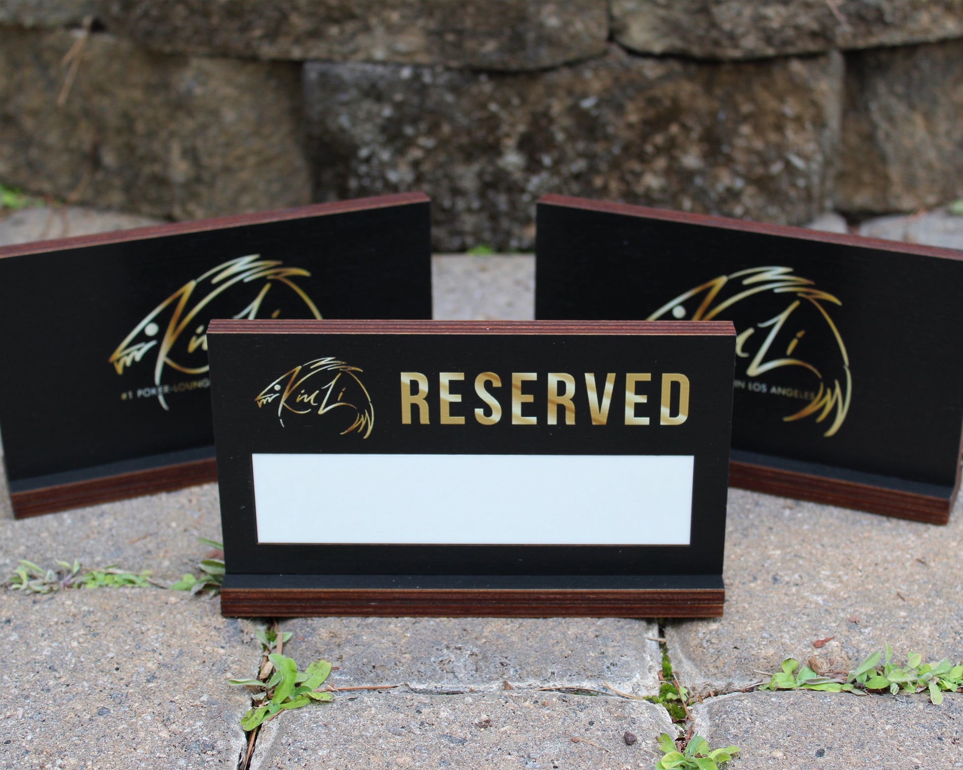 Black birch reserved table sign with dry erase panel and gold UV print