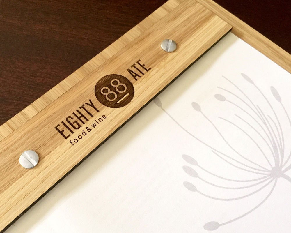A4 wooden menu display with engraved branding