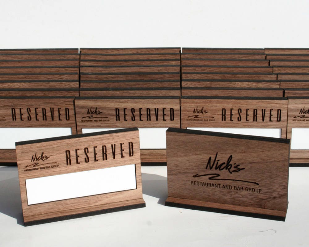Reusable table reserved sign in walnut wood with logo