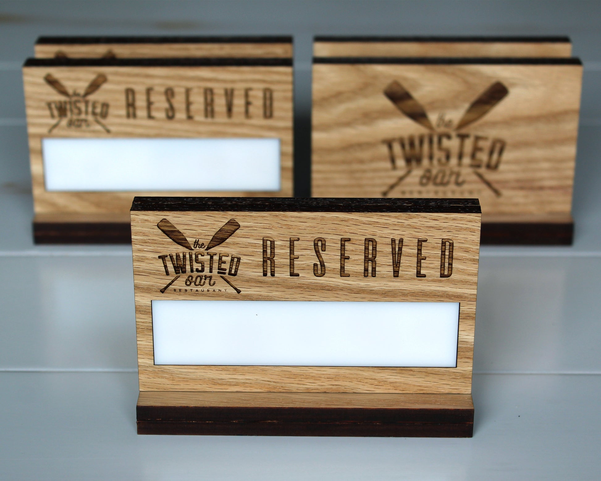 Natural oak reserved tabletop sign for restaurants