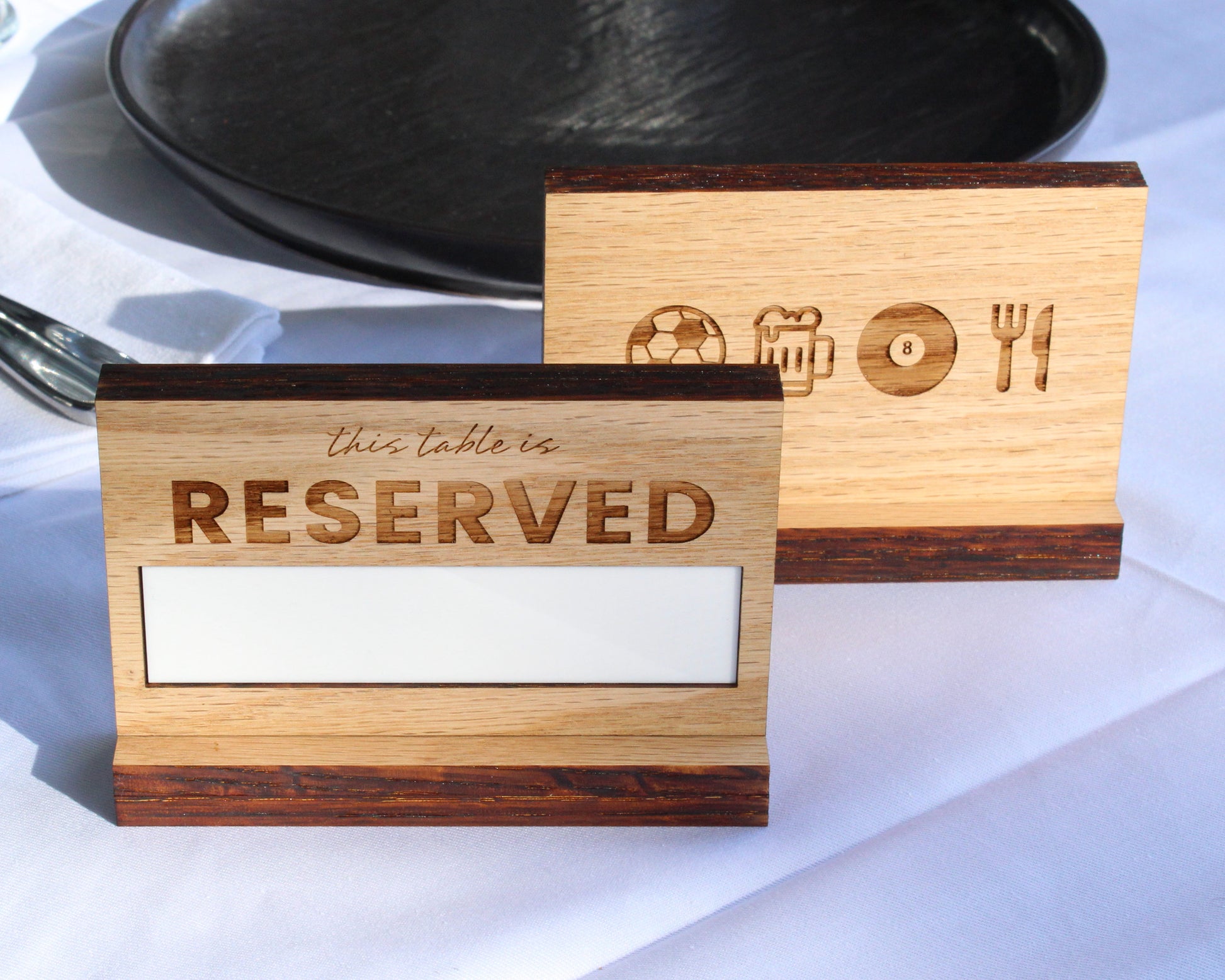 Solid oak reserved sign with dry erase panel