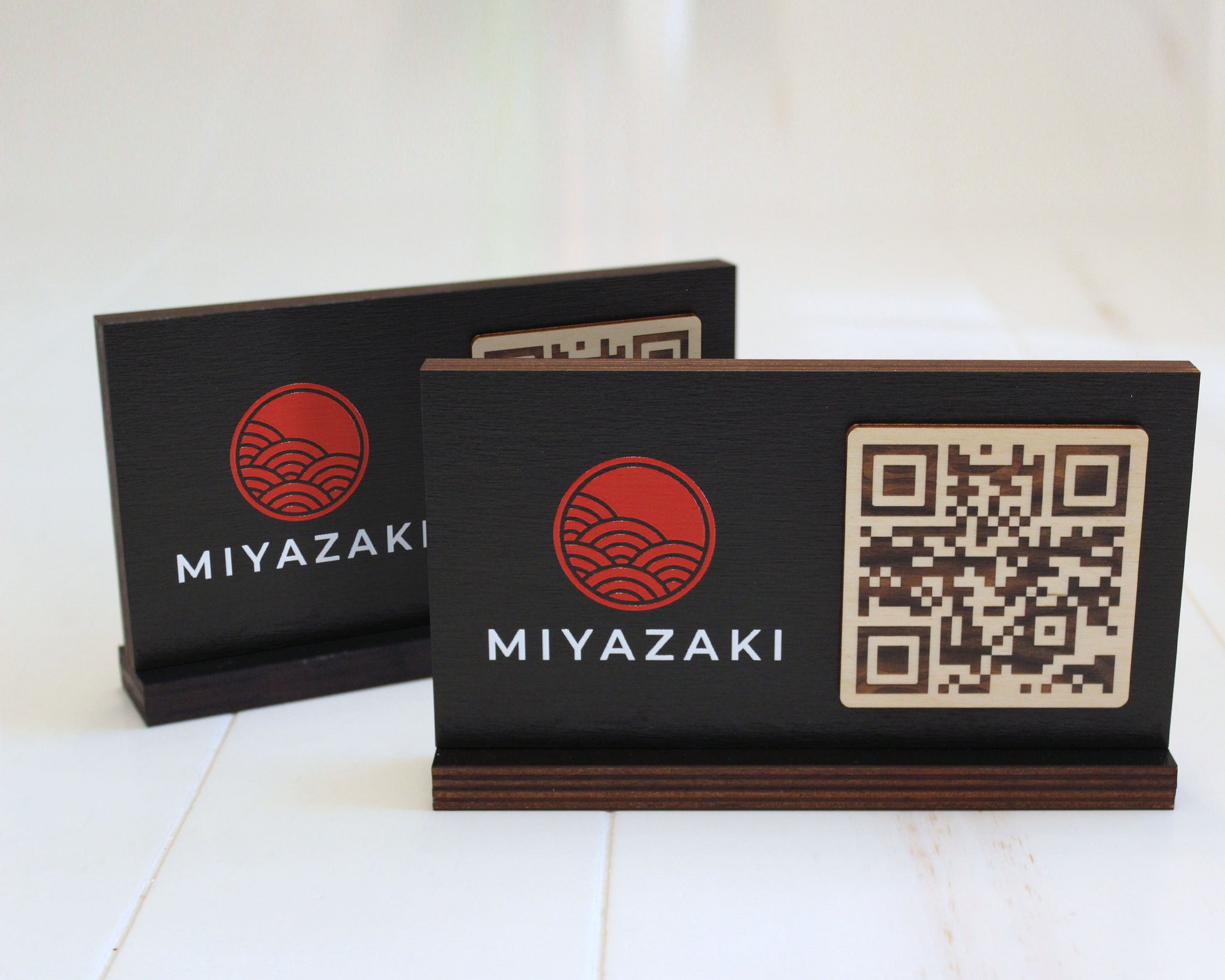 Custom printed QR menu display in black birch