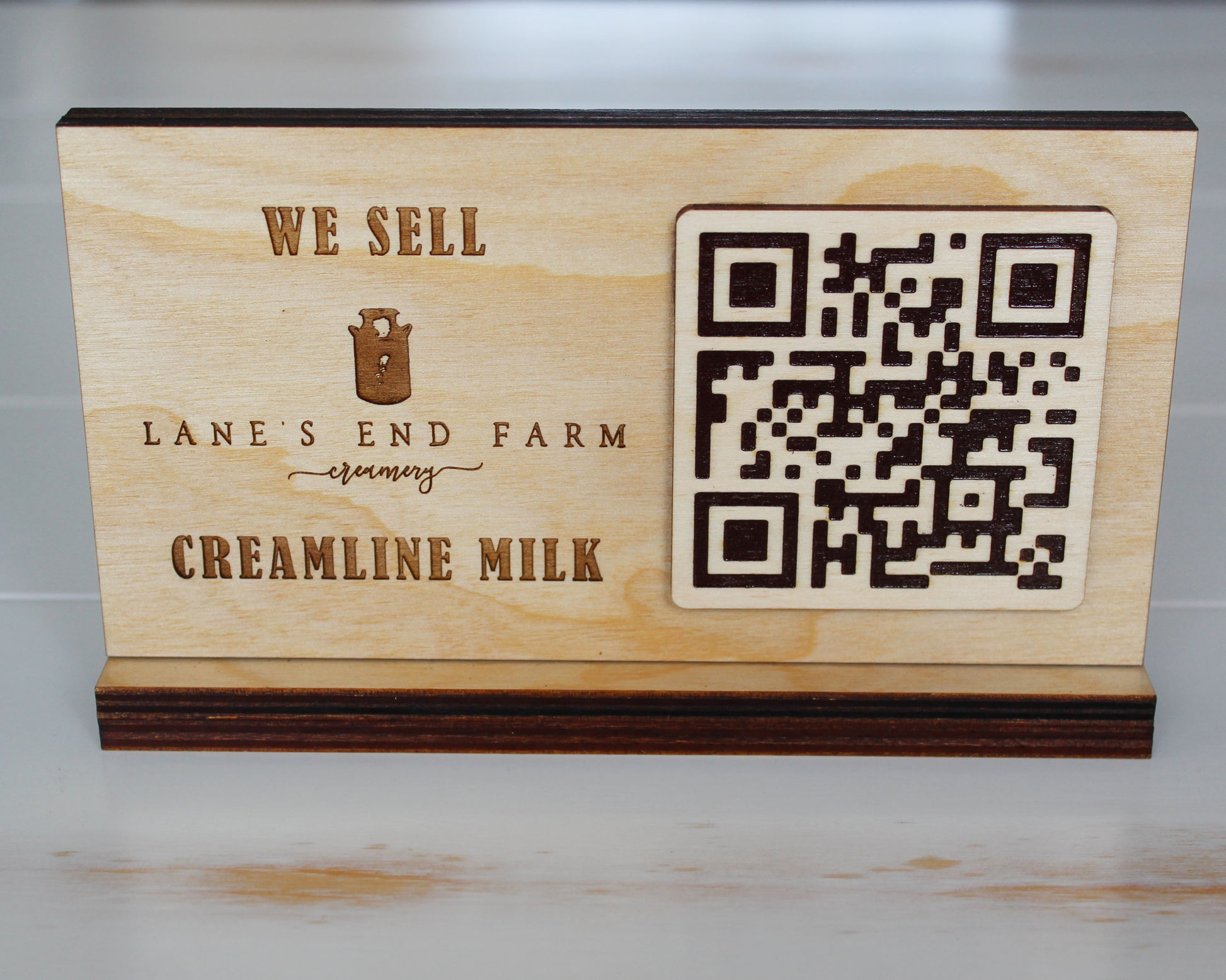 Engraved birch wood QR code sign with scannable code