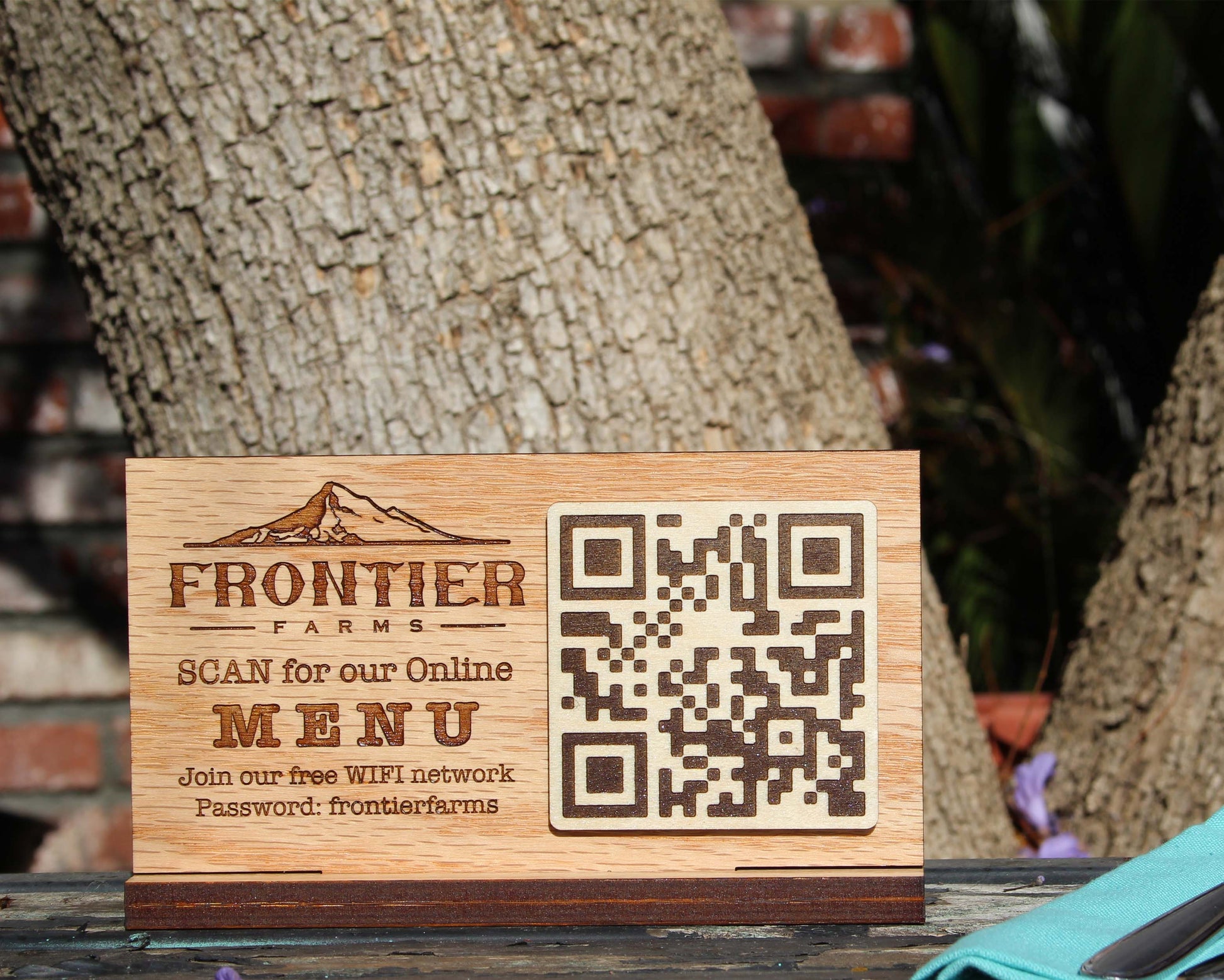 Custom oak QR code sign with engraved logo