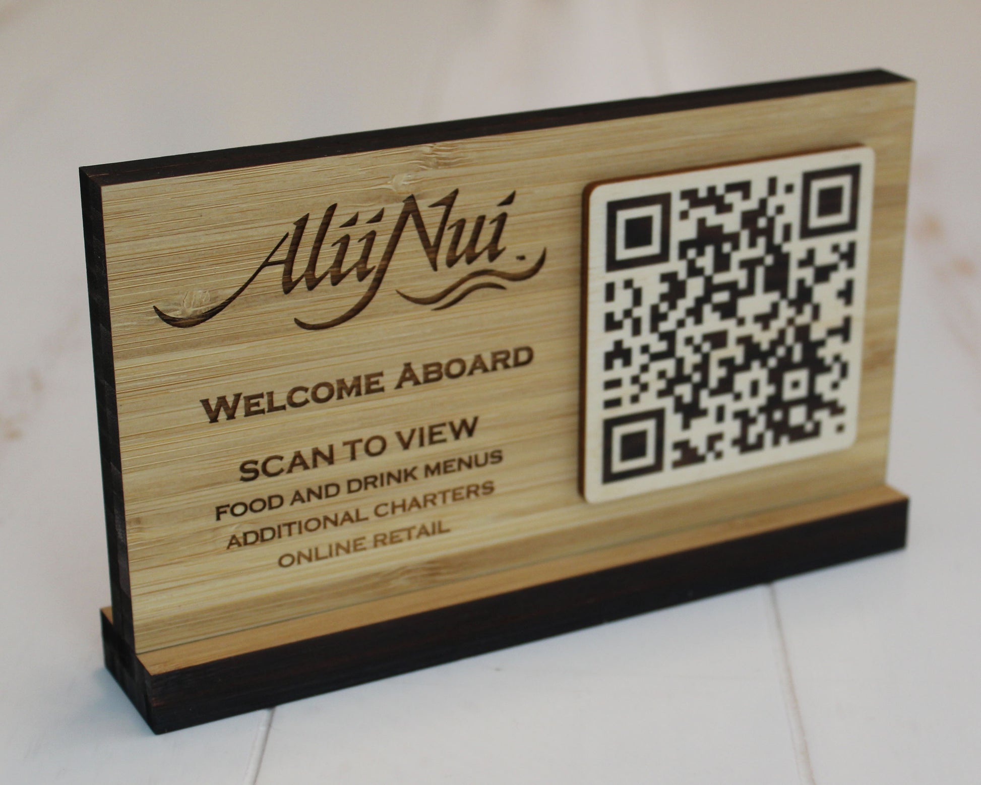 Double-sided bamboo QR code display with engraved details