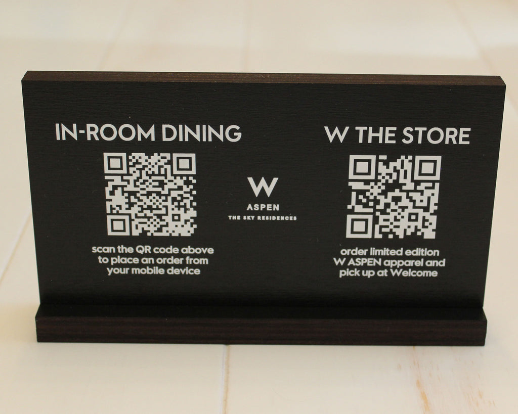 Black stained birch QR code sign for in-room dining menu.