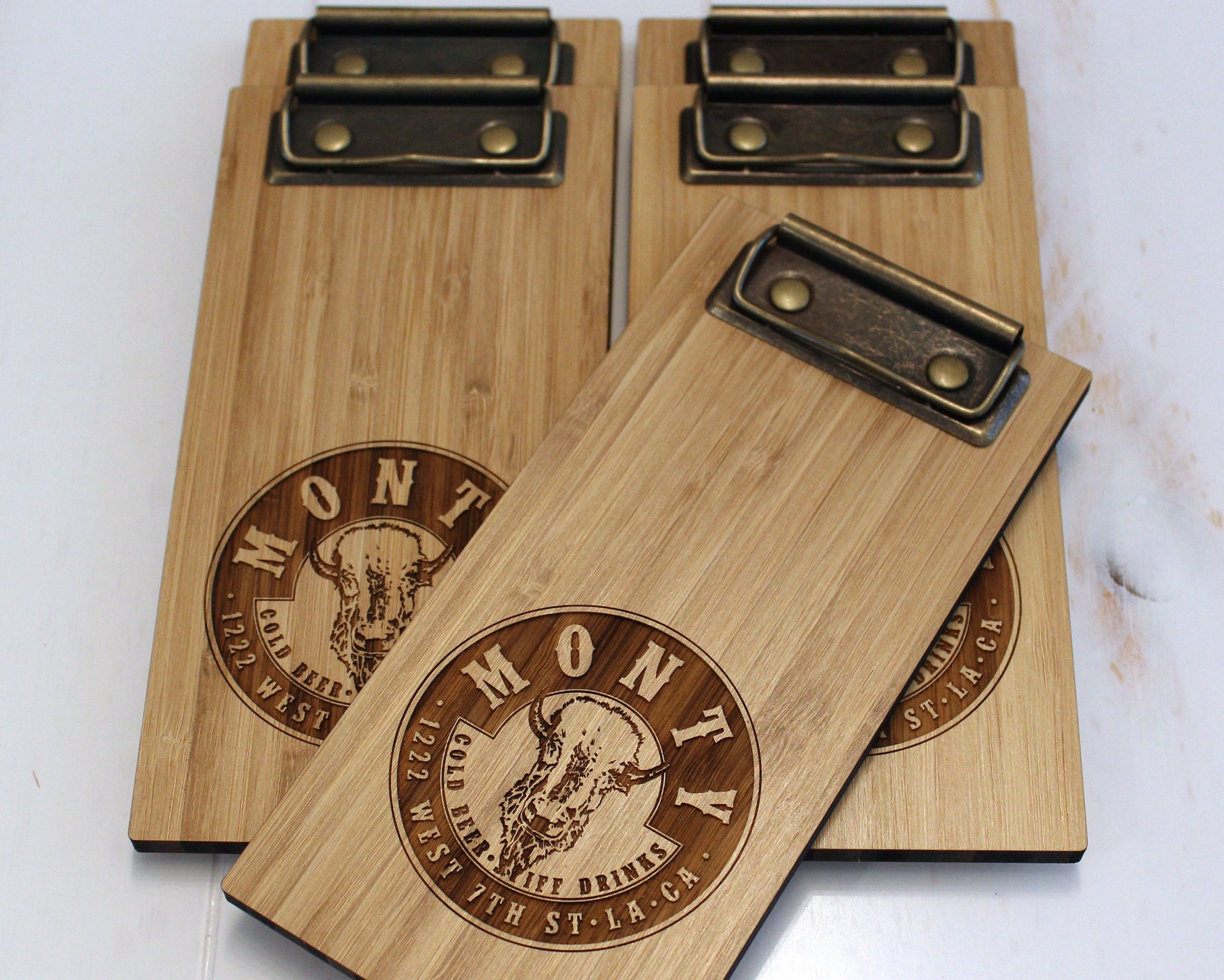 Personalized bamboo checkbook holder for hospitality use