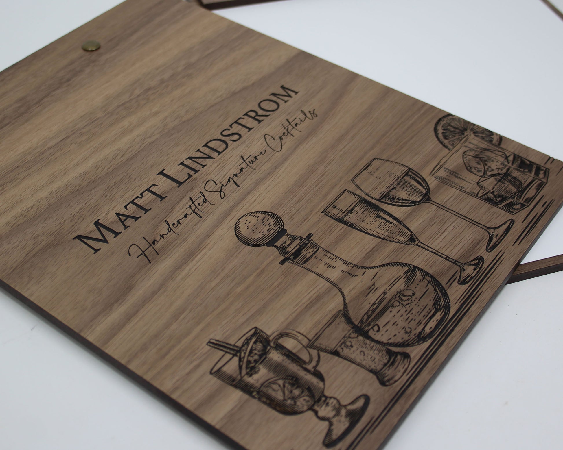 Walnut wood menu holder with antiqued brass screws for home bar